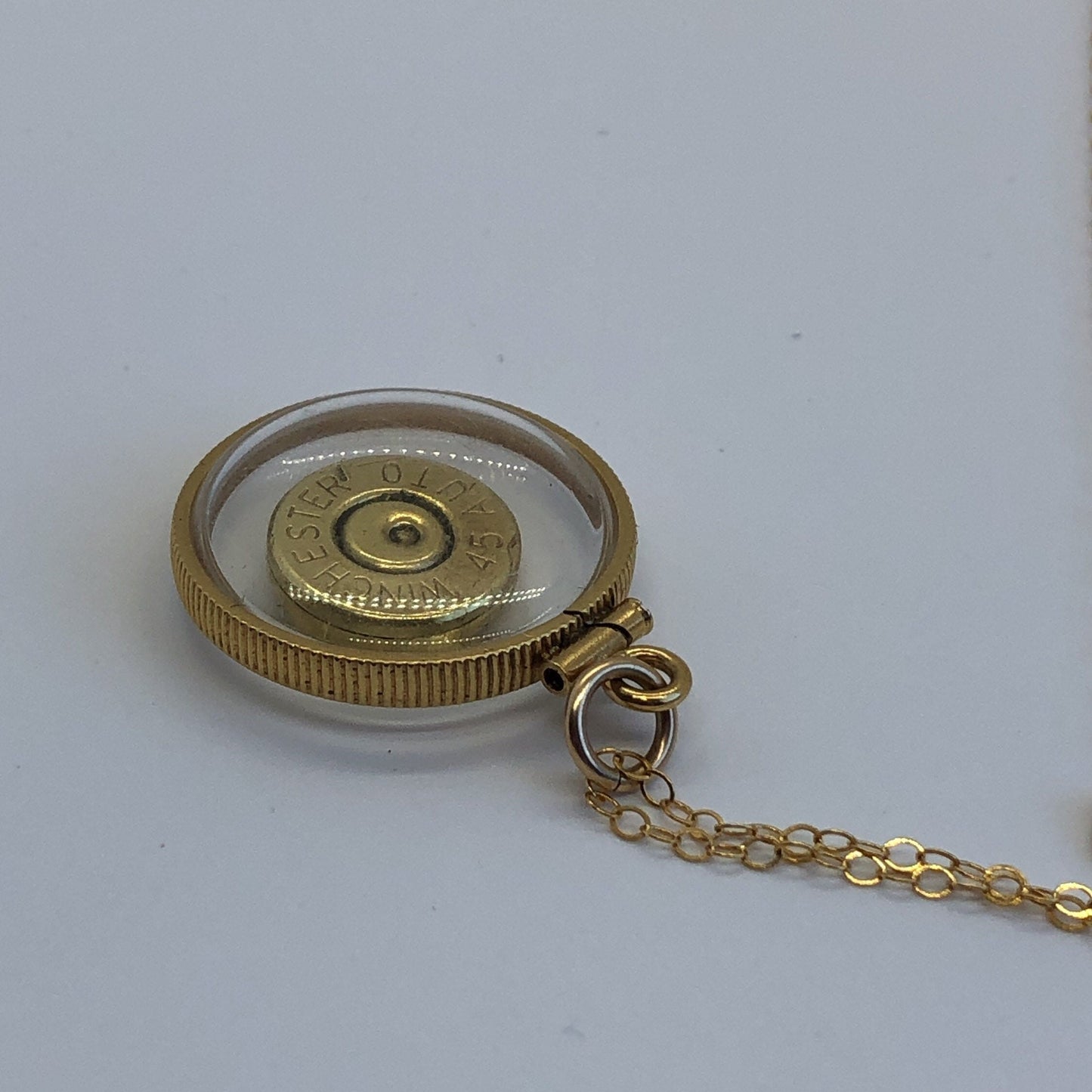 Winchester 45 cal. bullet necklace, back to back view locket, 14k gold filled locket, February birthstone