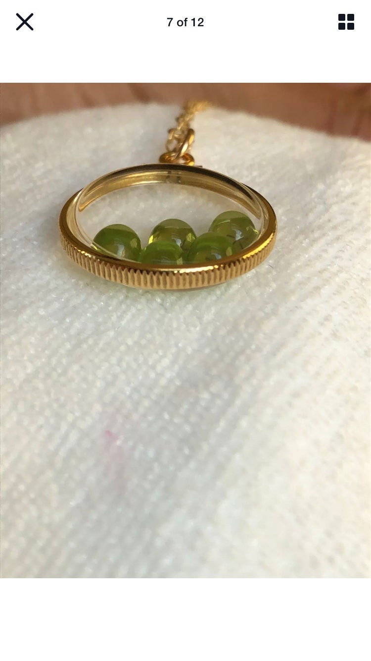 Vintage 12k gold filled locket with five 5mm beautiful green peridot cabochons, 3.26 TCW