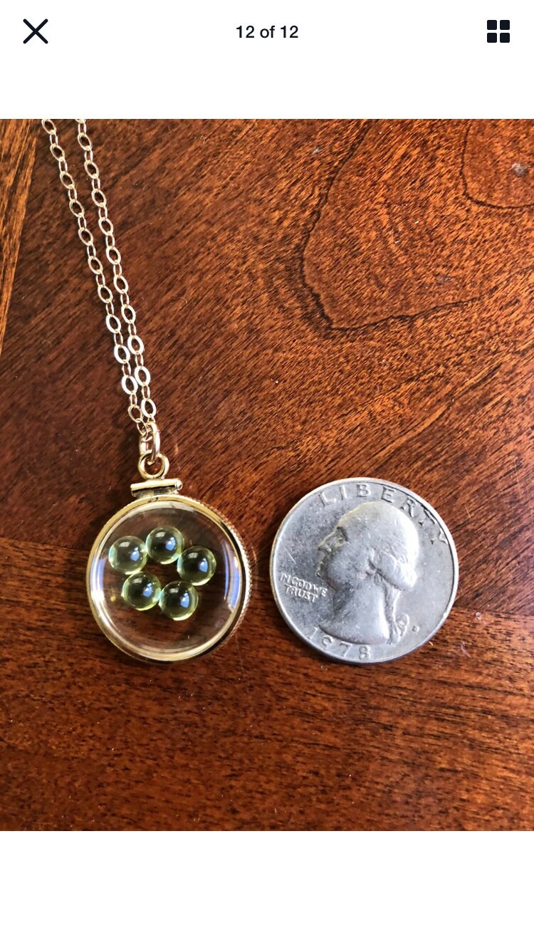 Vintage 12k gold filled locket with five 5mm beautiful green peridot cabochons, 3.26 TCW