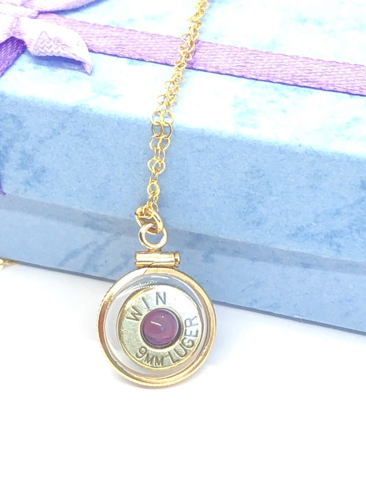 Handmade 14k gold filled 9mm bullet view locket, finished with a 4mm genuine garnet gemstone, view from both sides