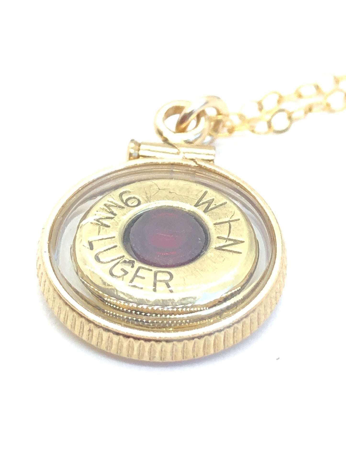 Handmade 14k gold filled 9mm bullet view locket, finished with a 4mm genuine garnet gemstone, view from both sides