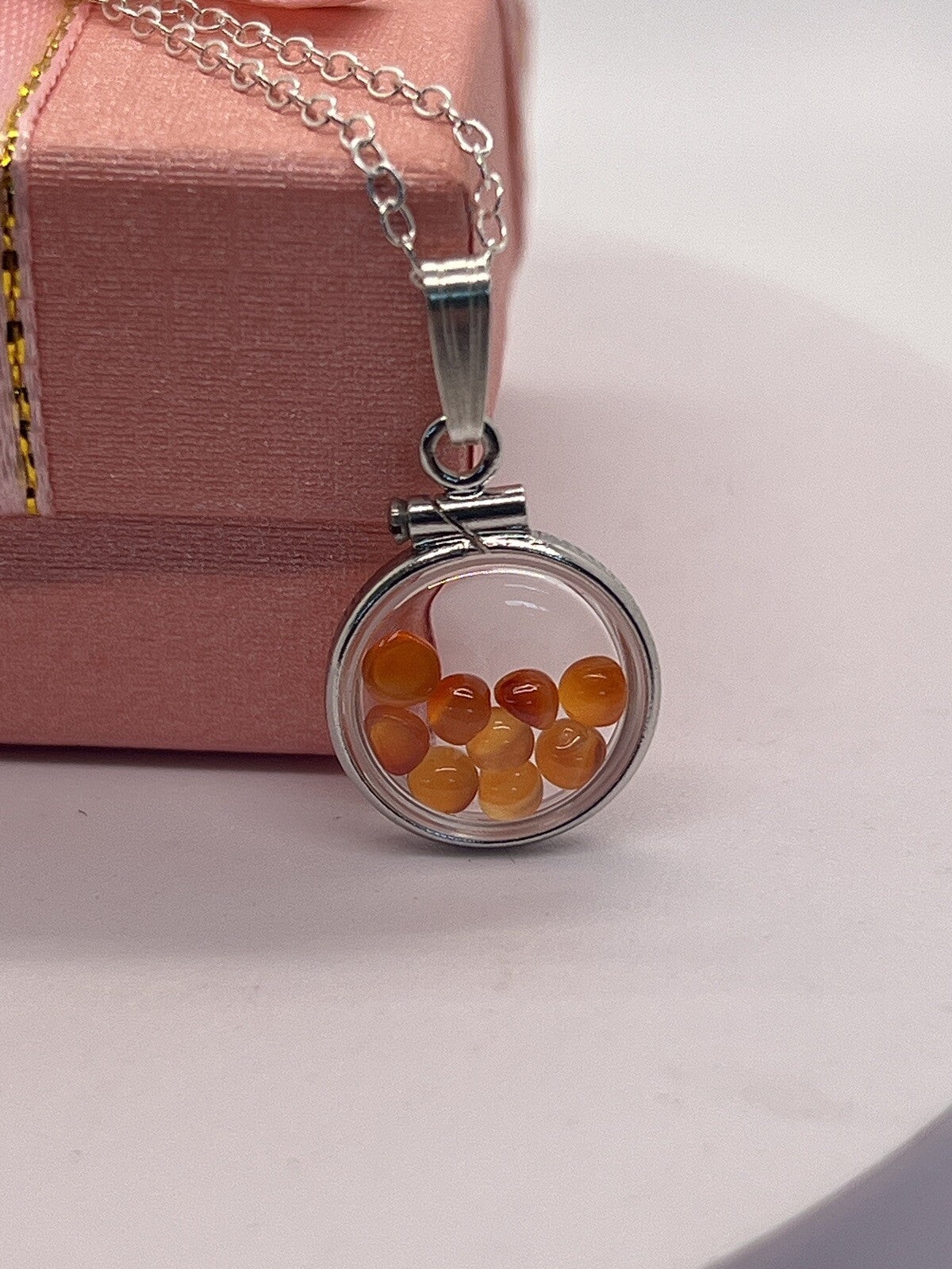 Diminutive Silver Carnelian Shaker Locket Lucite, natural orange cabs. 1.25 TCW