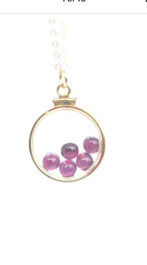 Vintage 12k gold filled locket with floating 5 beautiful Garnet cabochons 4 TCW
