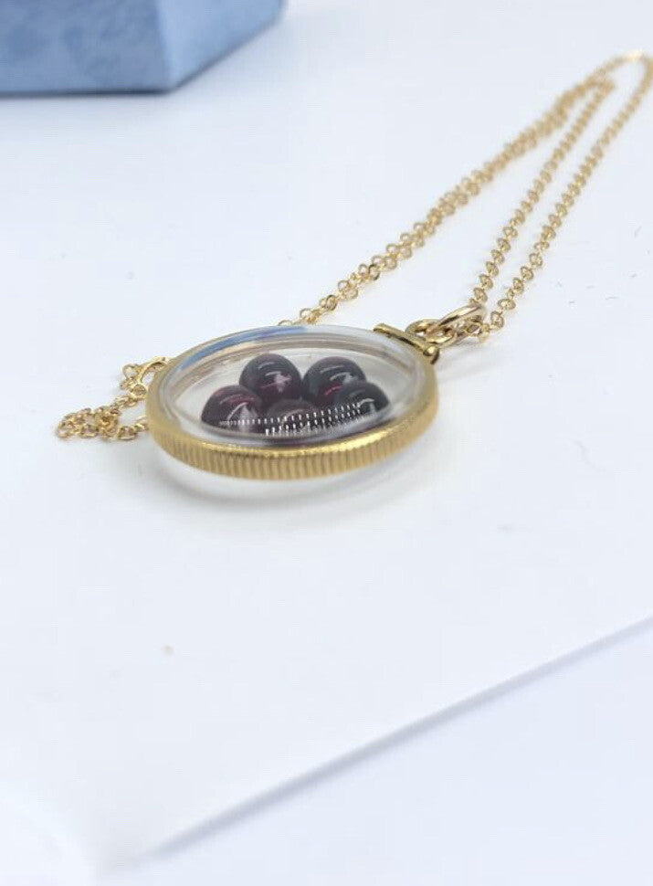Vintage 12k gold filled locket with floating 5 beautiful Garnet cabochons 4 TCW