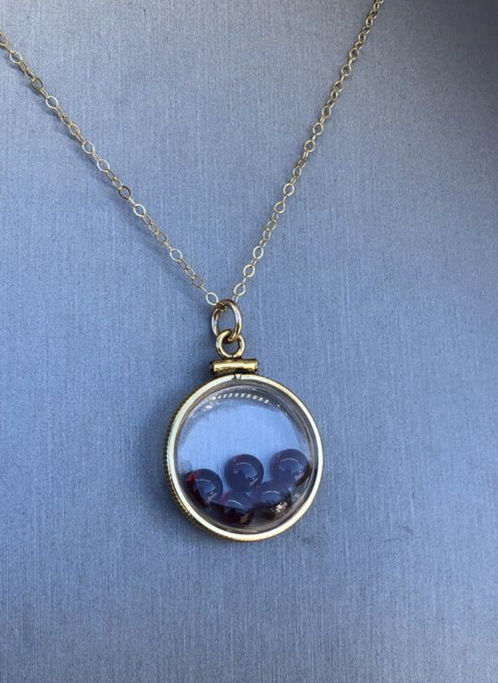 Vintage 12k gold filled locket with floating 5 beautiful Garnet cabochons 4 TCW