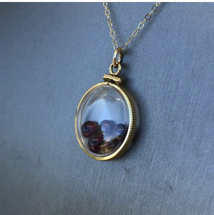 Vintage 12k gold filled locket with floating 5 beautiful Garnet cabochons 4 TCW