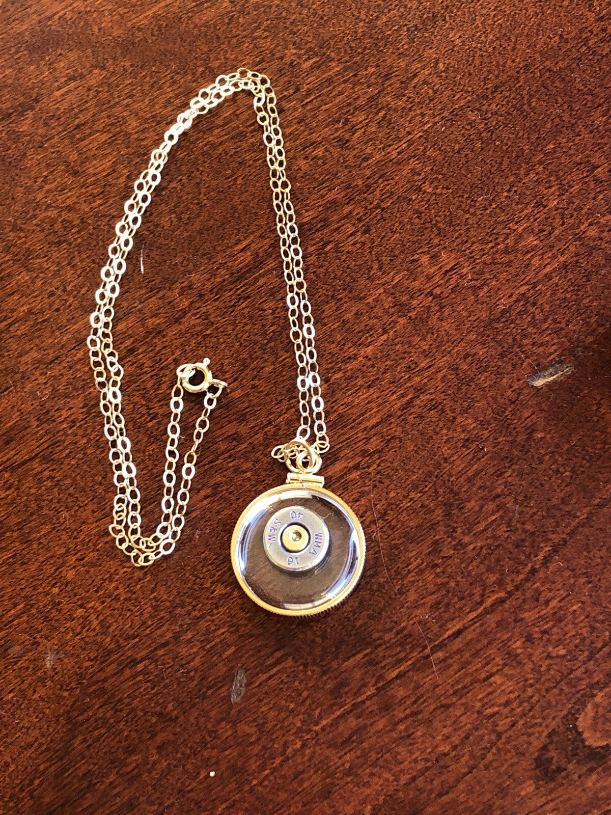 S&W 40 cal bullet necklace,back to back view locket, 14k gold filled locket-new