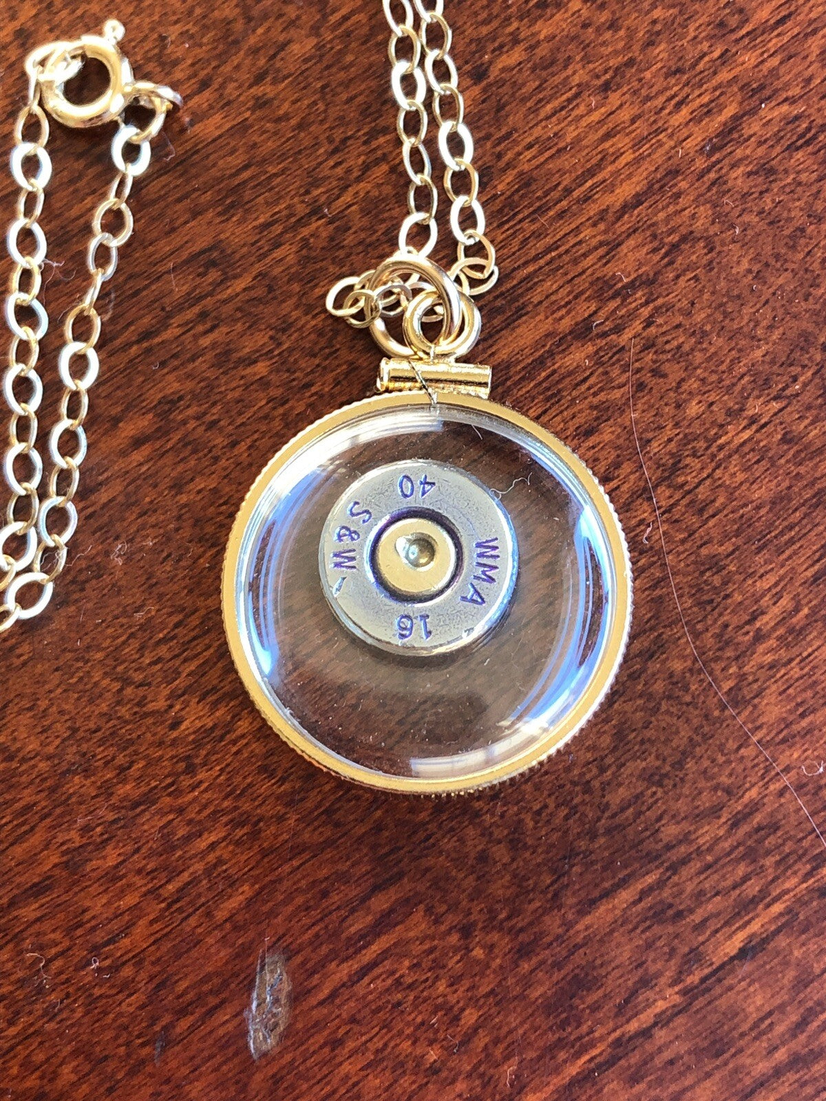 S&W 40 cal bullet necklace,back to back view locket, 14k gold filled locket-new
