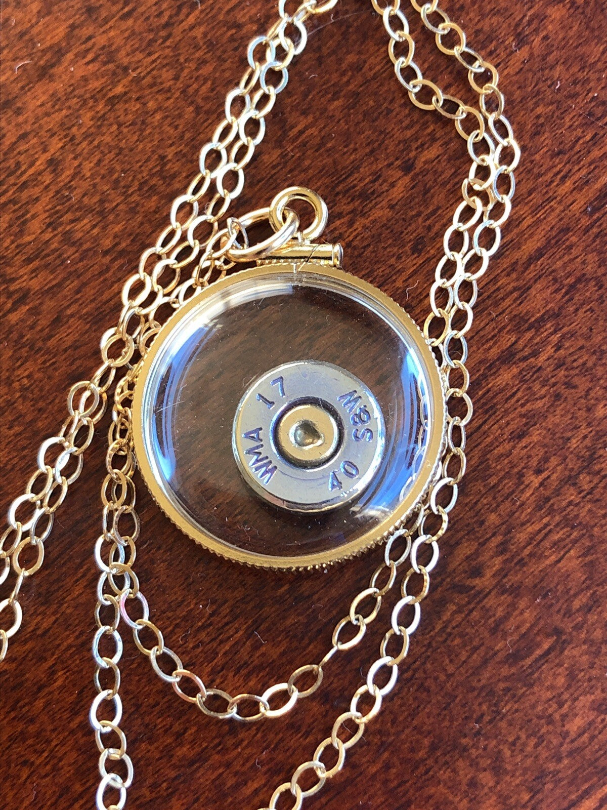 S&W 40 cal bullet necklace,back to back view locket, 14k gold filled locket-new