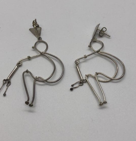 Large handmade sterling silver earring, Indonesia, unique human form