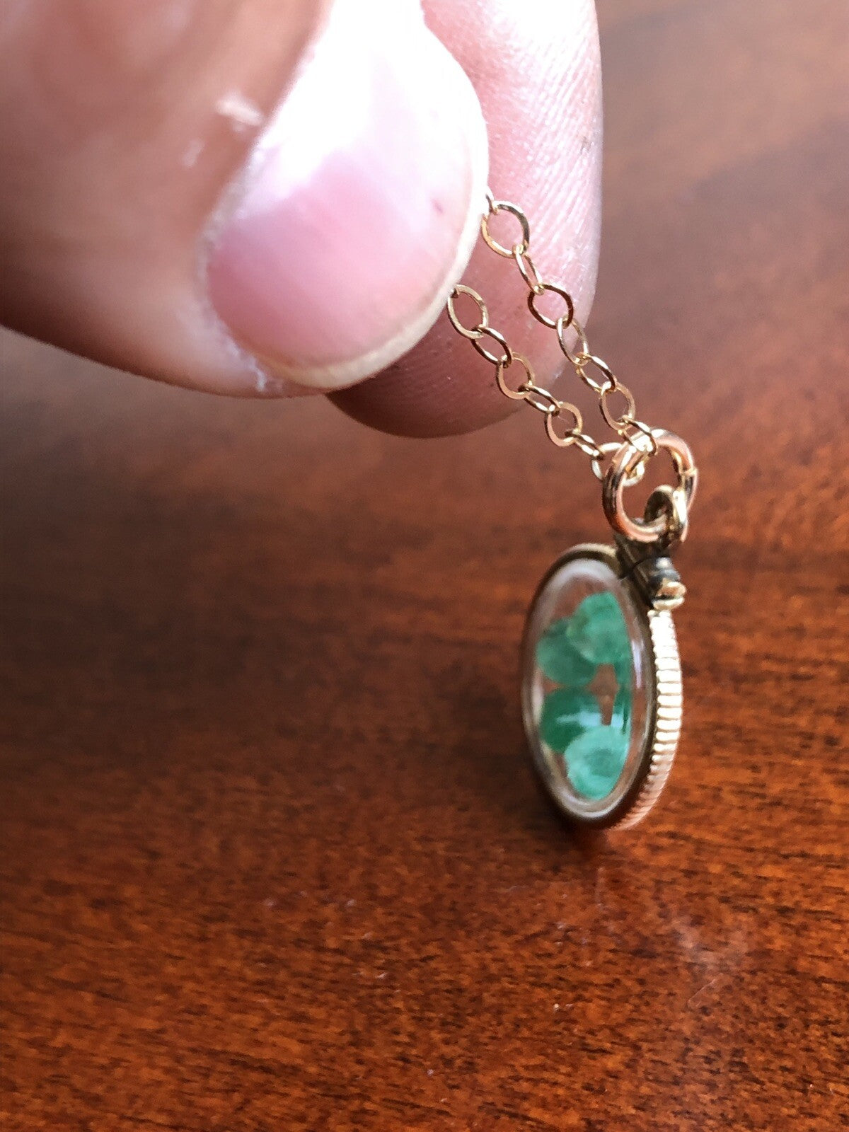 Vintage 12k gold filled locket with beautiful faceted genuine Emeralds.