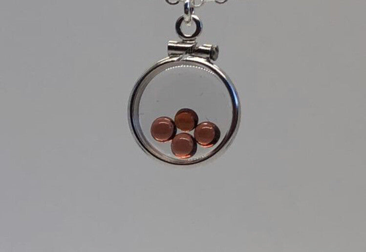 12.5 mm Handmade sterling silver shaker locket with 0.85 TCW of genuine garnets
