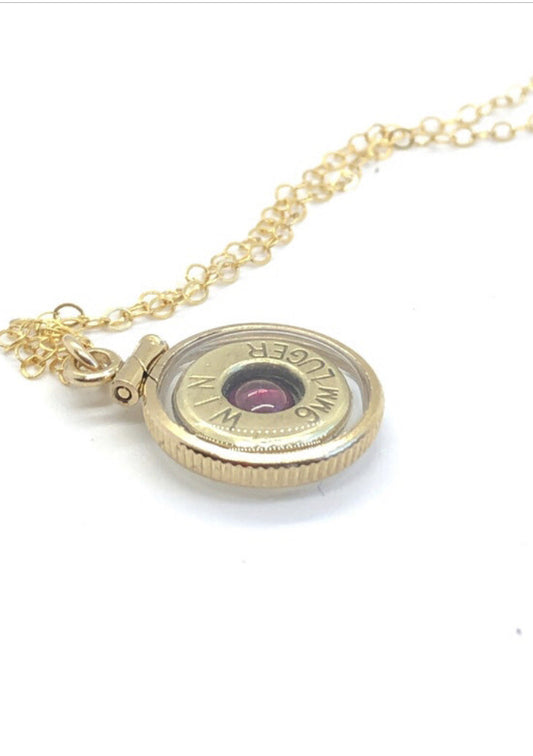 Handmade 14k gold filled 9 mm bullet view locket, with a genuine garnet
