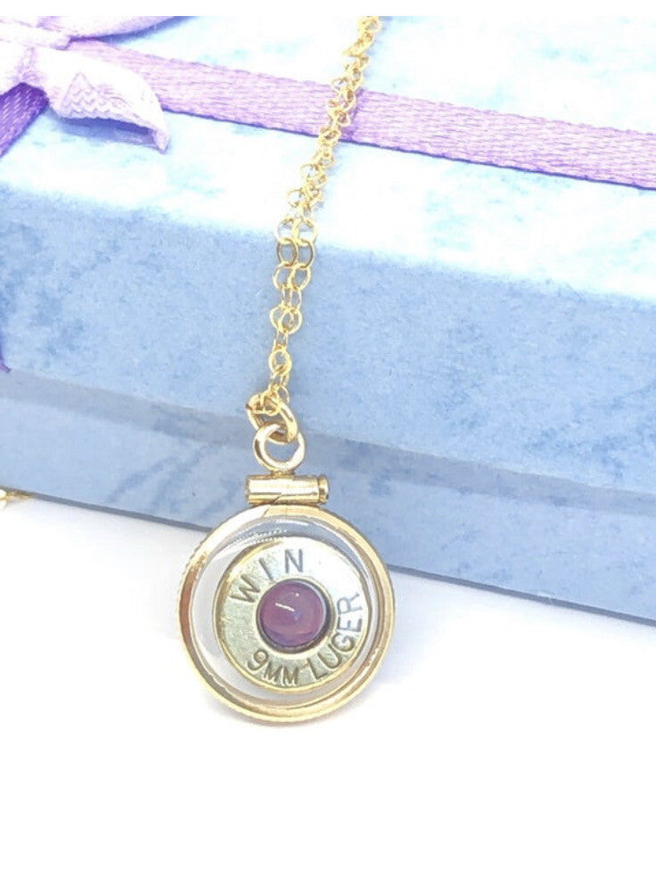 Handmade 14k gold filled 9 mm bullet view locket, with a genuine garnet