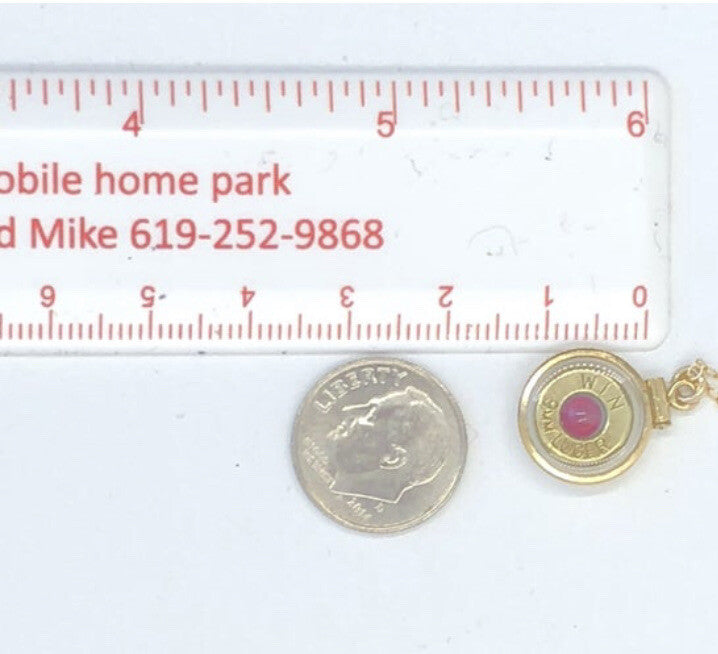 Handmade 14k gold filled 9 mm bullet view locket, with a genuine garnet