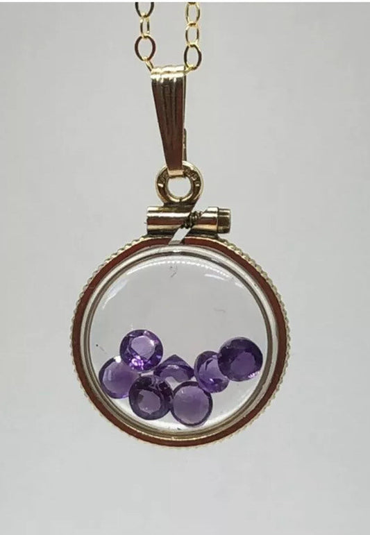 15 mm Vintage 12k gold filled locket with 7 ,3mm beautiful cut amethyst 0.7 tcw