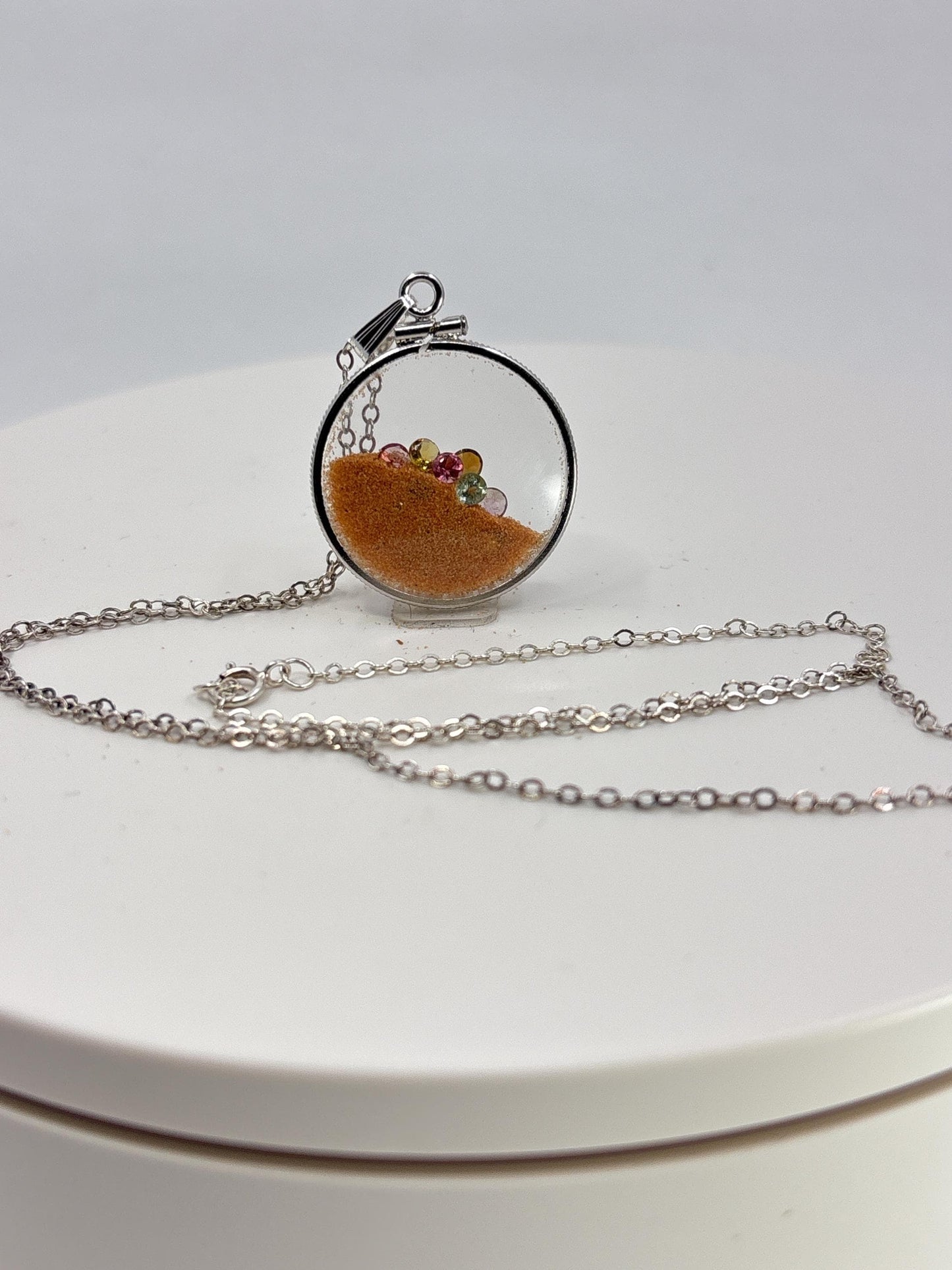 Multicolor Tourmaline Shaker locket W/ Pink Coral Sand in Sterling Silver coin edge bezel, peek a boo gems. Unique.