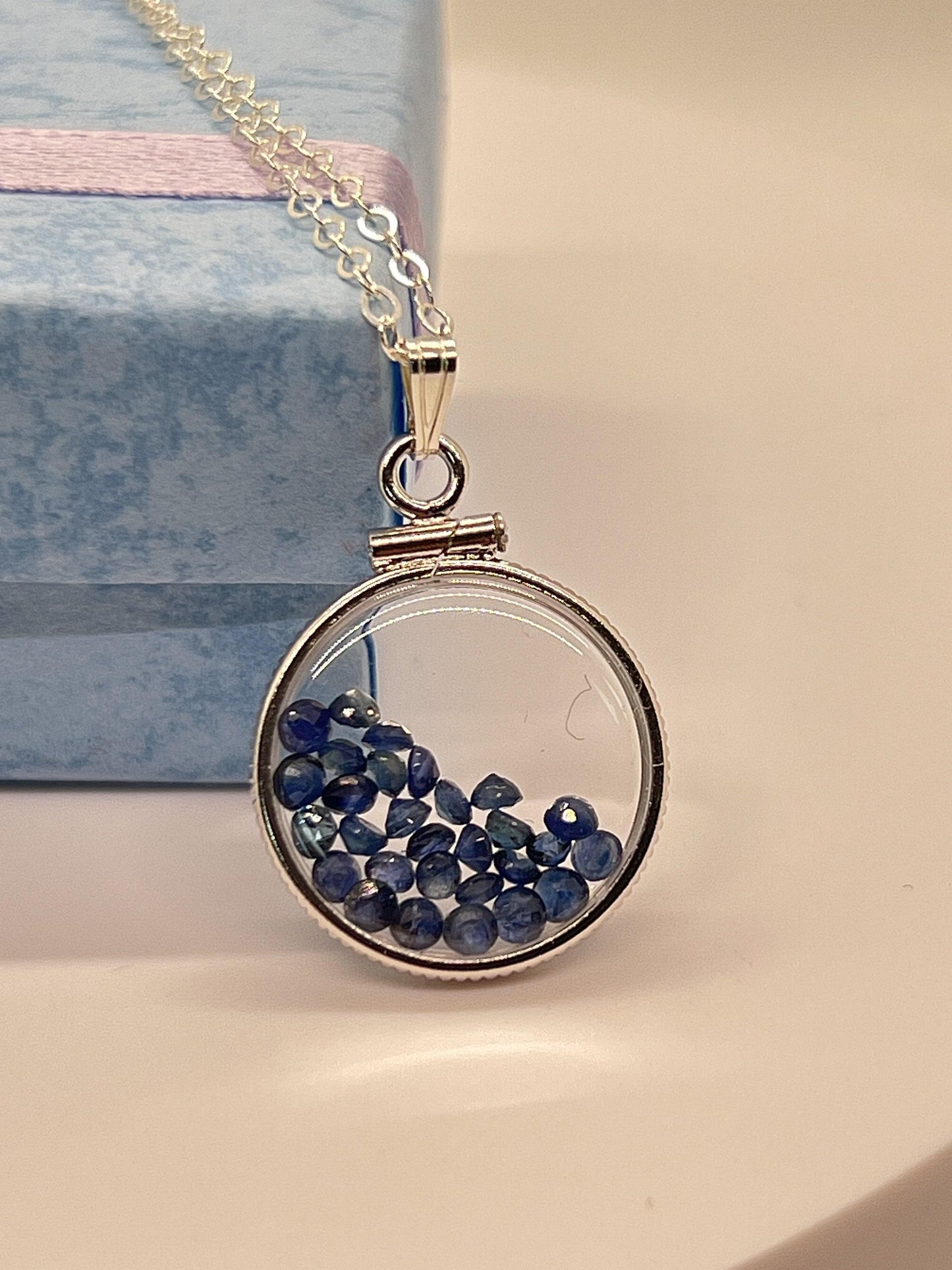 Handmade dime size sterling silver sapphire shaker locket lucite view locket, necklace, beautiful september birthstone. 2.5 tcw