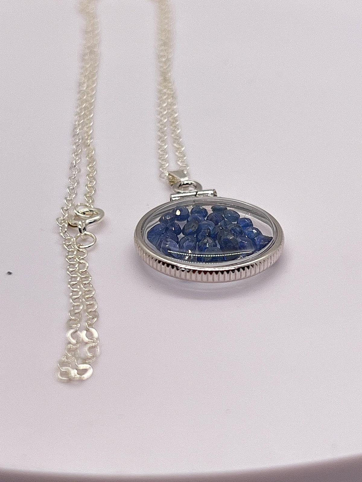Handmade dime size sterling silver sapphire shaker locket lucite view locket, necklace, beautiful september birthstone. 2.5 tcw
