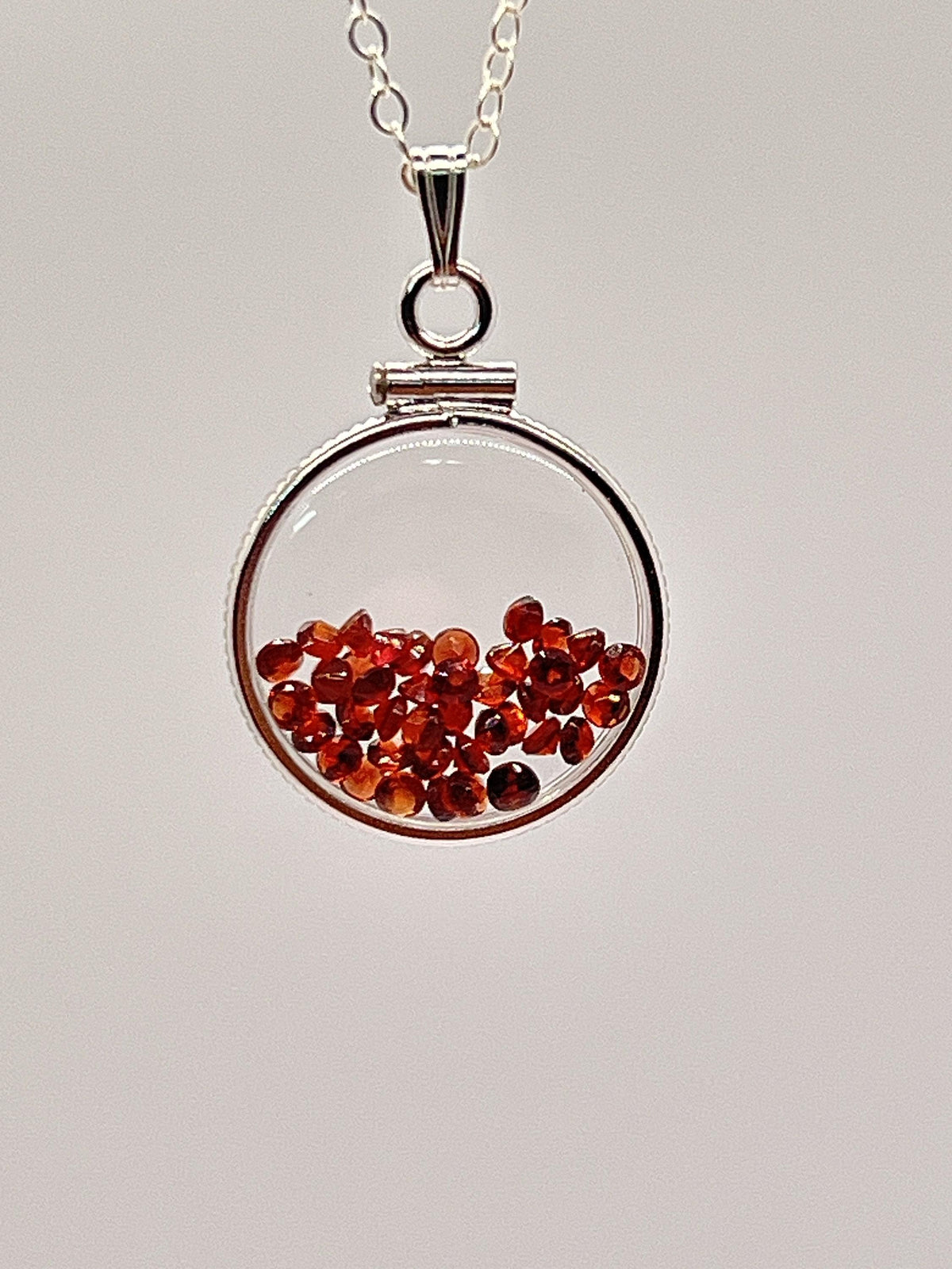 Handmade dime size sterling silver garnet shaker locket lucite view locket, necklace, beautiful january birthstone. 2.9 tcw, red round cut