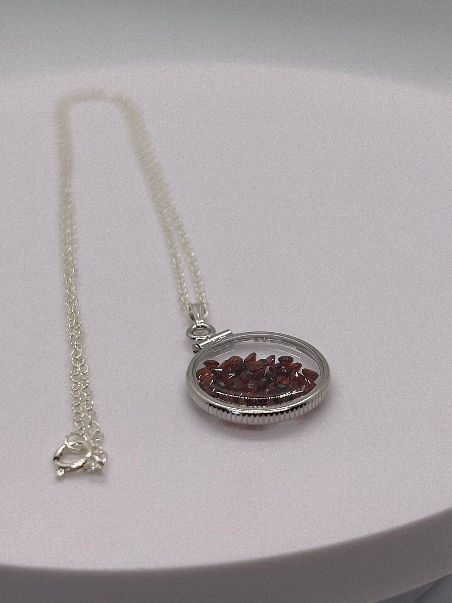 Handmade dime size sterling silver garnet shaker locket lucite view locket, necklace, beautiful january birthstone. 2.9 tcw, red round cut