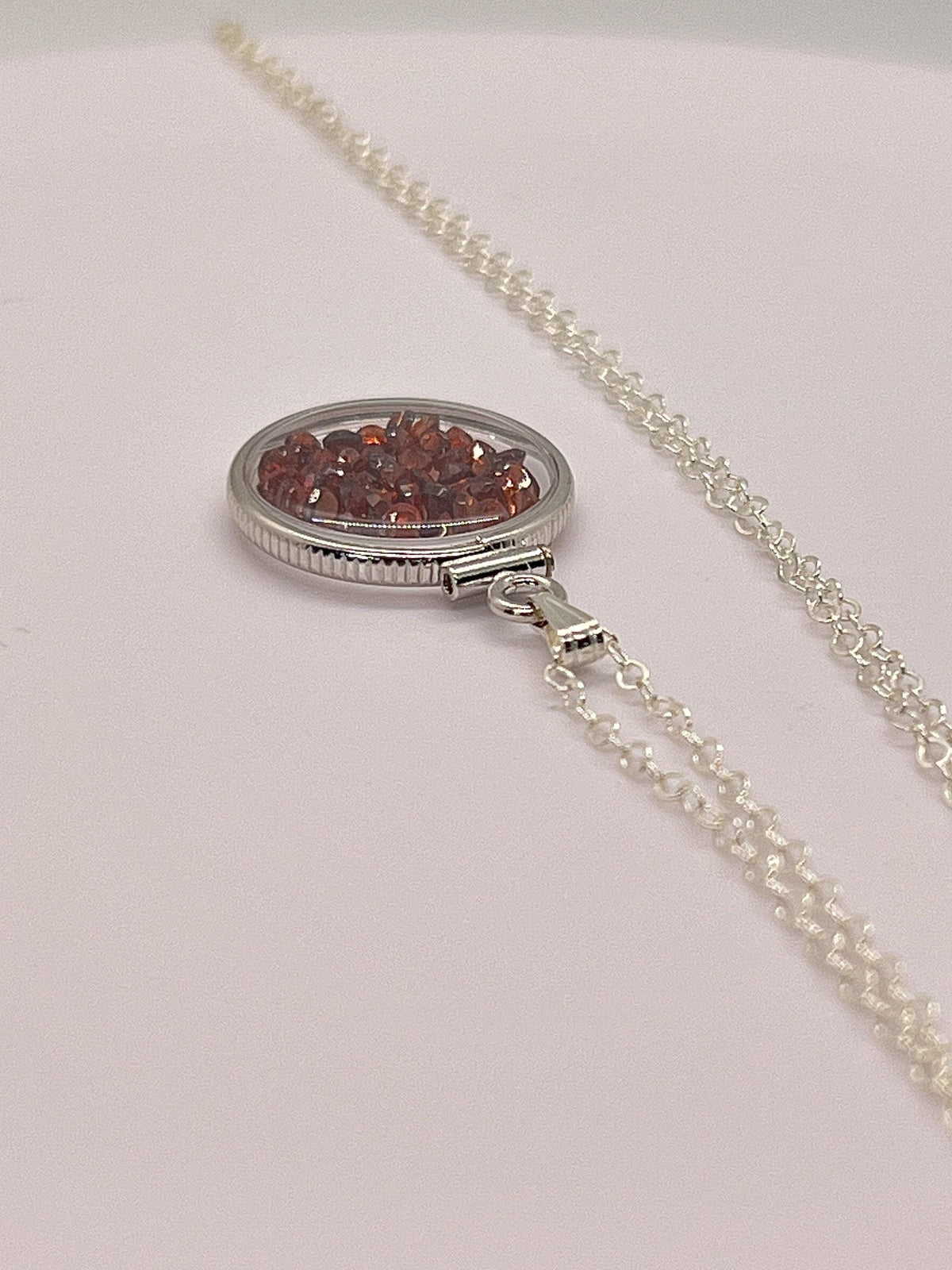 Handmade dime size sterling silver garnet shaker locket lucite view locket, necklace, beautiful january birthstone. 2.9 tcw, red round cut