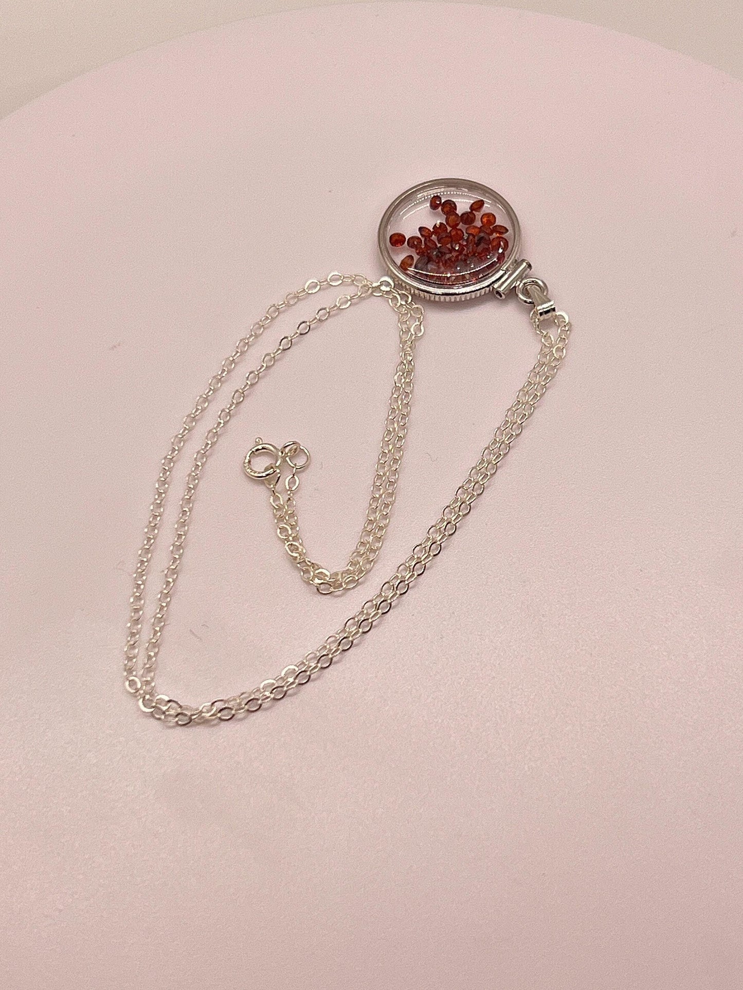Handmade dime size sterling silver garnet shaker locket lucite view locket, necklace, beautiful january birthstone. 2.9 tcw, red round cut