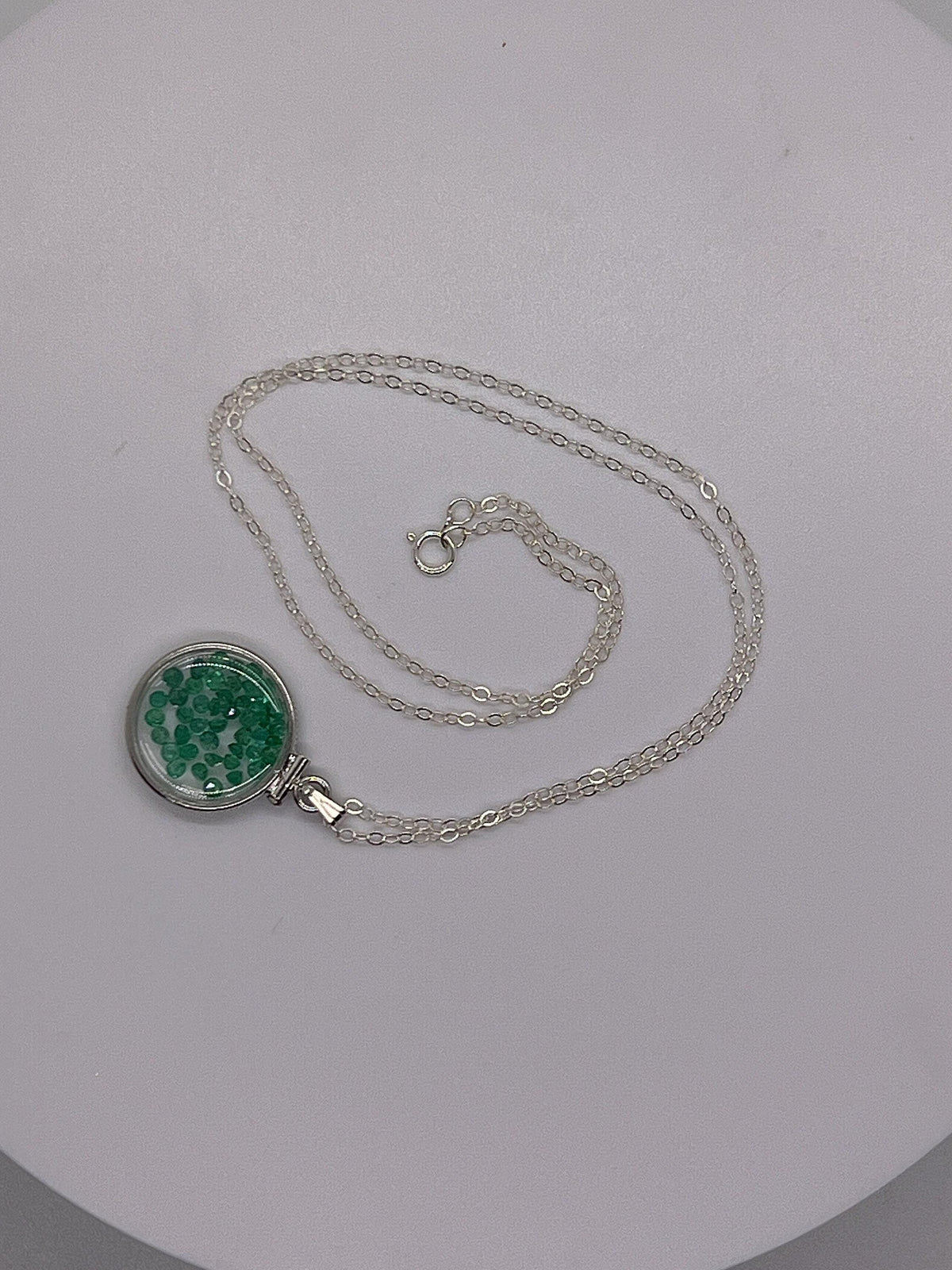 Handmade dime size  sterling silver emerald shaker locket lucite view locket, necklace, beautiful may birthstone. 2.0 tcw