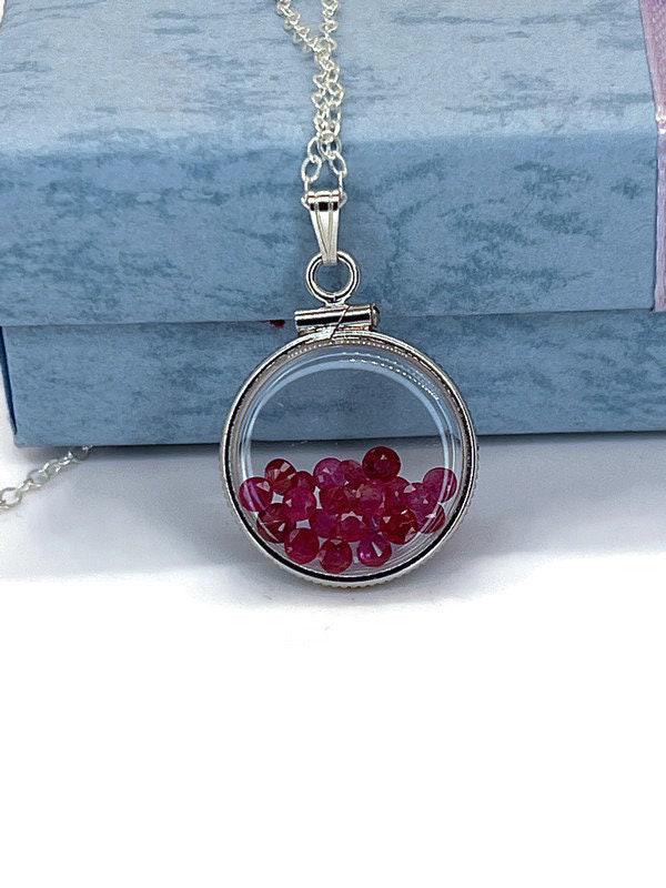 Handmade dime size  sterling silver ruby shaker locket lucite view locket, necklace, beautiful july birthstone. 2.5 tcw round cut rubies