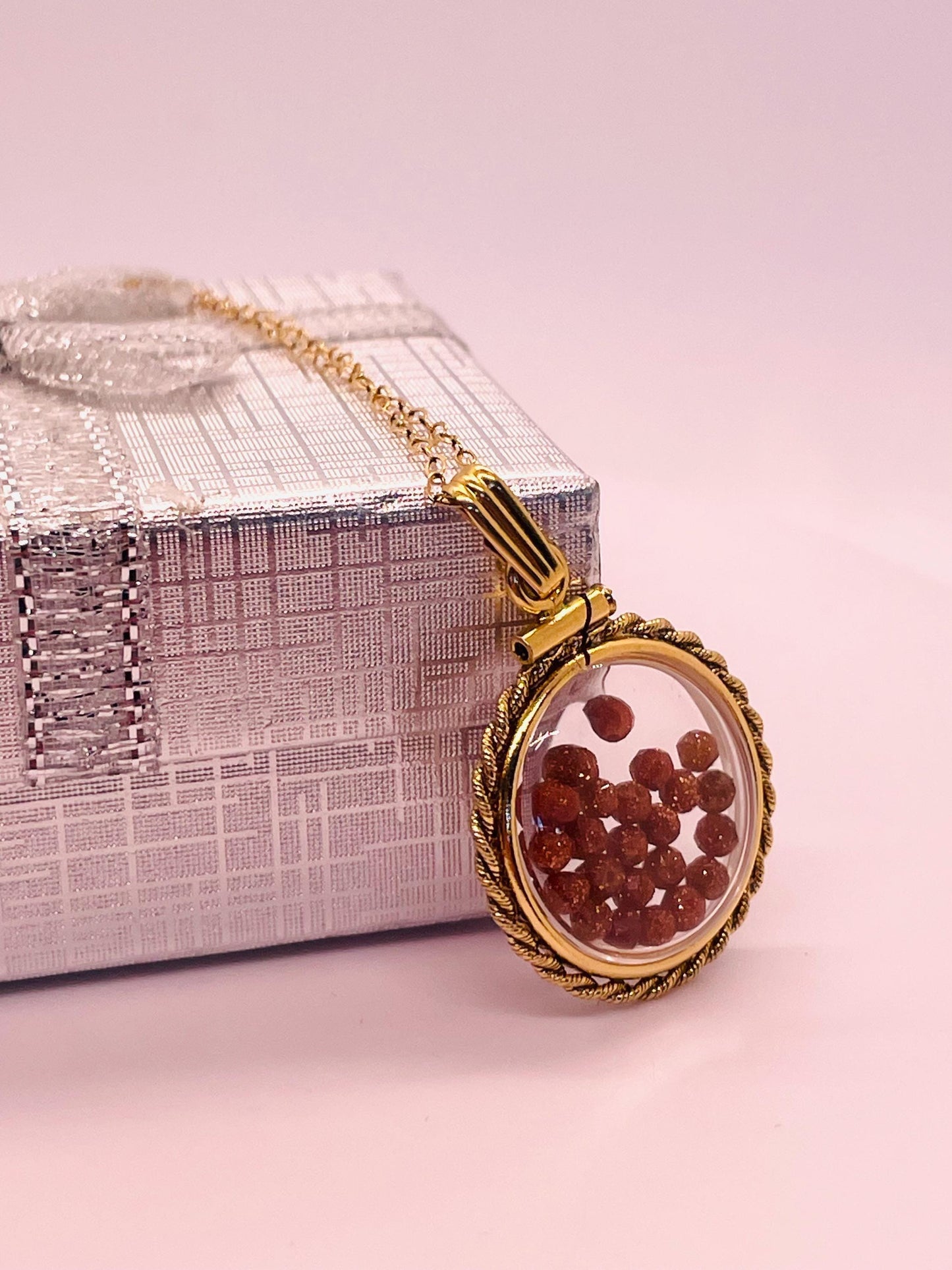 Hand made 21 mm nickel size 14k gold filled lucite genuine golden sandstone shaker locket with rope edge and beautiful bead crystals.