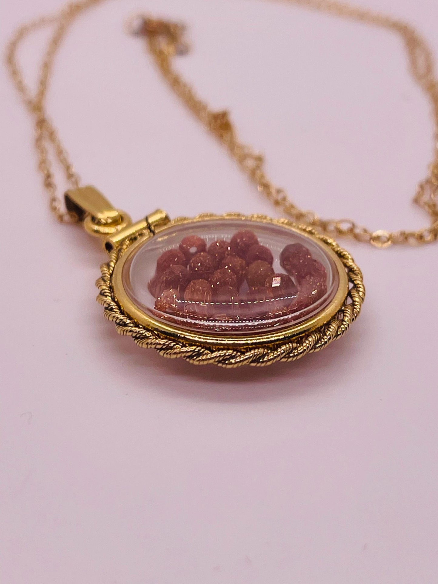 Hand made 21 mm nickel size 14k gold filled lucite genuine golden sandstone shaker locket with rope edge and beautiful bead crystals.