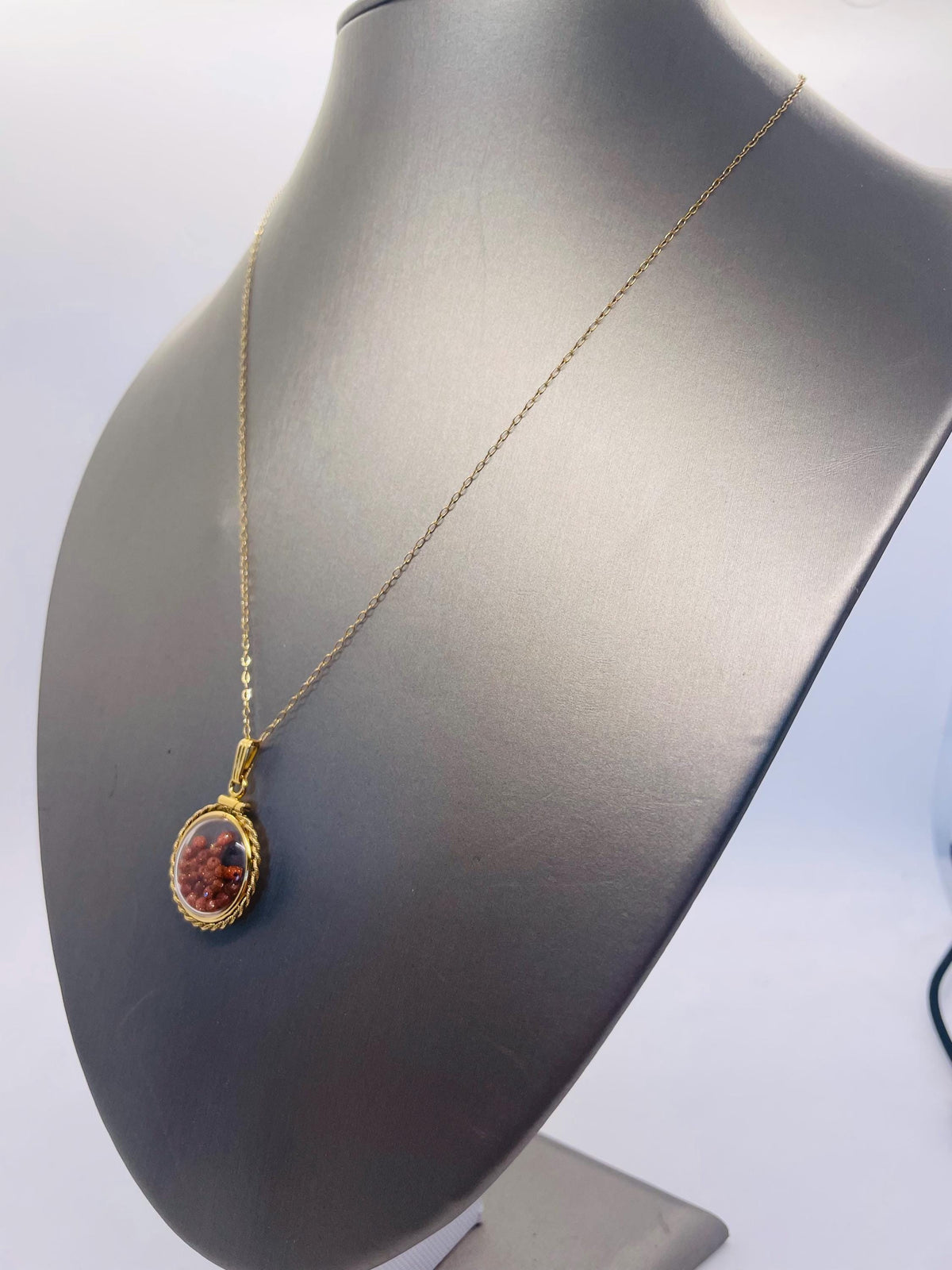 Hand made 21 mm nickel size 14k gold filled lucite genuine golden sandstone shaker locket with rope edge and beautiful bead crystals.