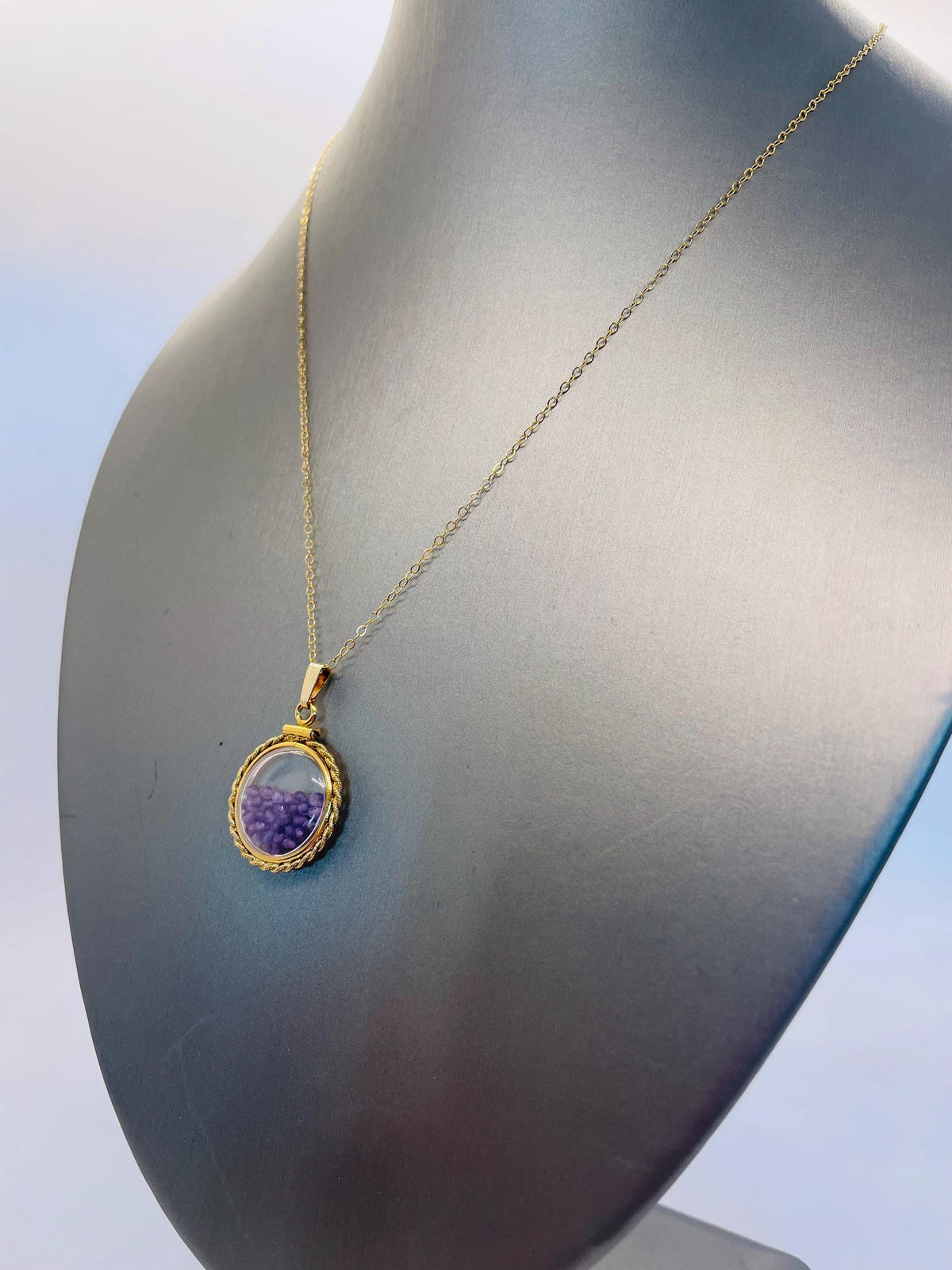 Hand made 21 mm nickel size 14k gold filled lucite genuine amethyst shaker locket with rope edge and beautiful bead crystals.