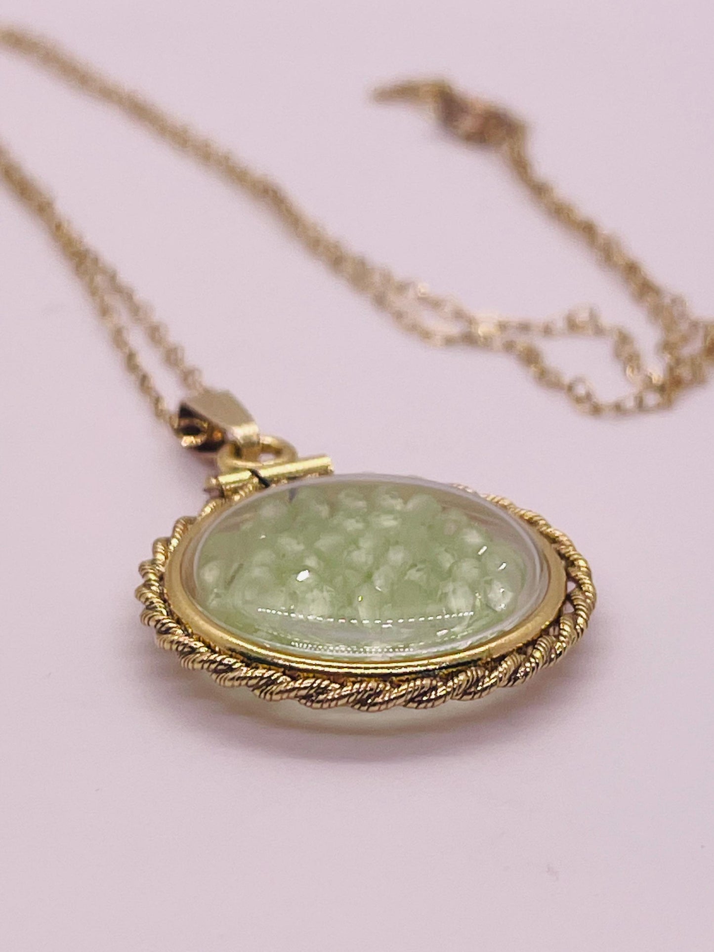 Hand made 21 mm nickel size 14k gold filled lucite genuine peridot shaker locket with rope edge and  beautiful bead crystals.