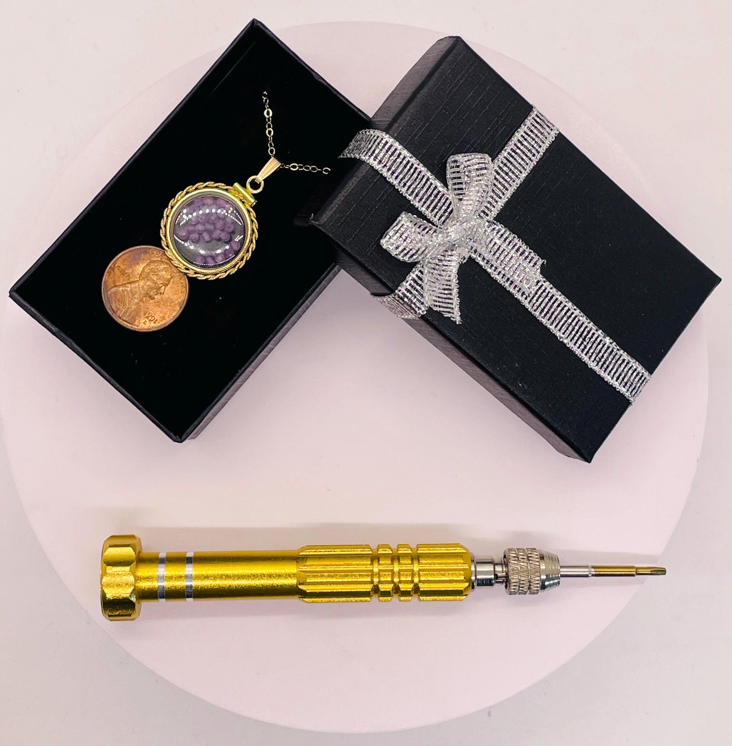 Hand made 21 mm nickel size 14k gold filled lucite genuine amethyst shaker locket with rope edge and beautiful bead crystals.