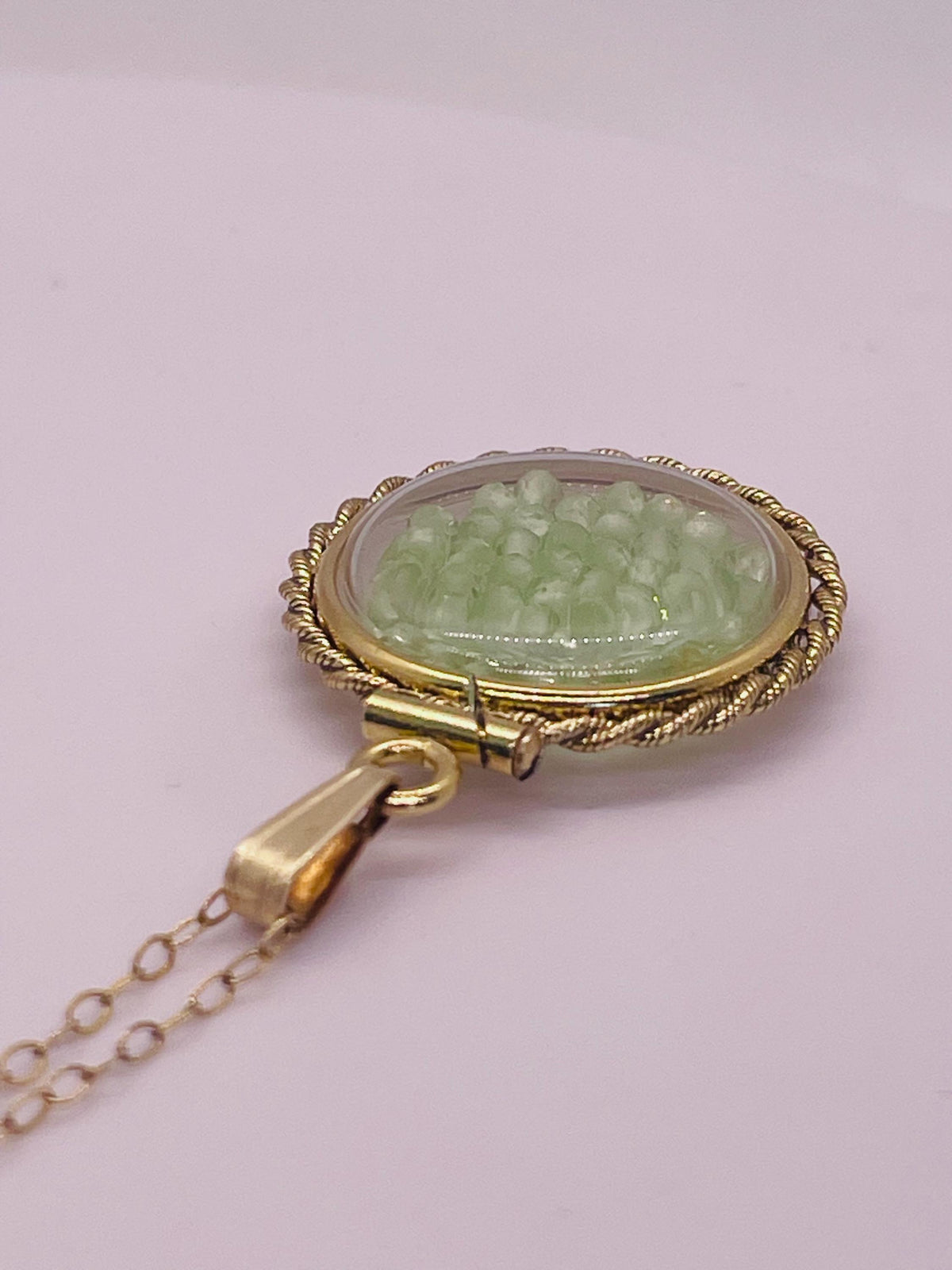 Hand made 21 mm nickel size 14k gold filled lucite genuine peridot shaker locket with rope edge and  beautiful bead crystals.
