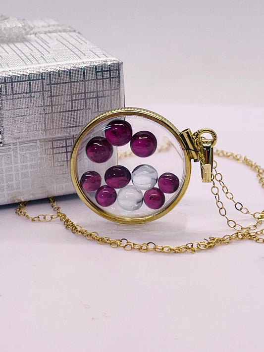 14k solid gold 22 mm handmade shaker locket filled with garnet and white topaz