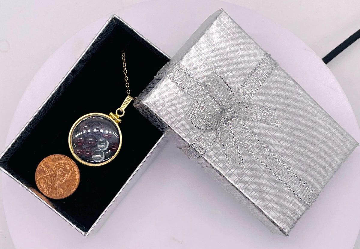 14k solid gold 22 mm handmade shaker locket filled with garnet and white topaz