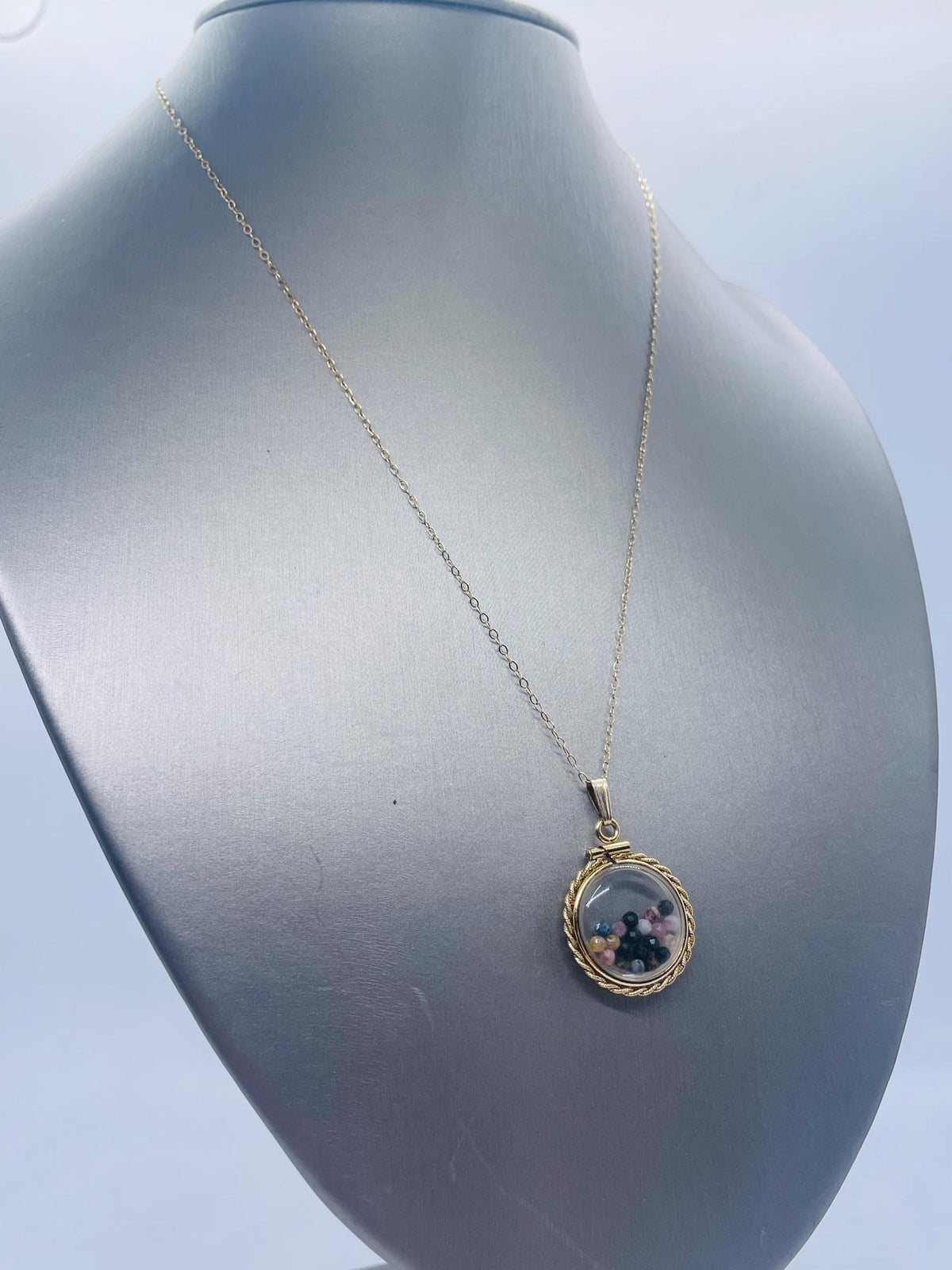 Hand made 21 mm nickel size 14k gold filled lucite genuine multi tourmaline shaker locket with rope edge and  beautiful bead crystals.