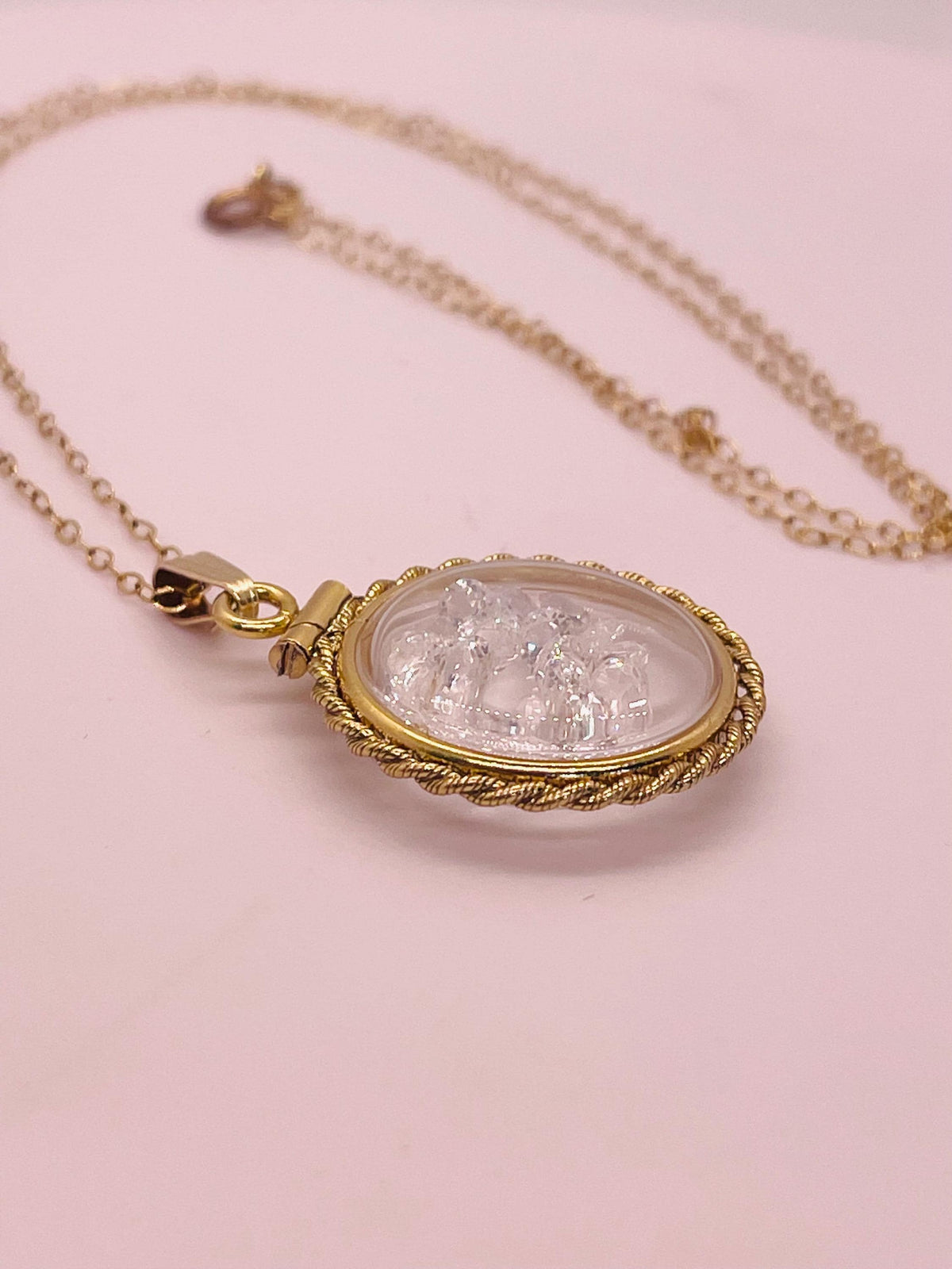 Hand made 21 mm nickel size 14k gold filled lucite genuine white topaz shaker locket with rope edge.