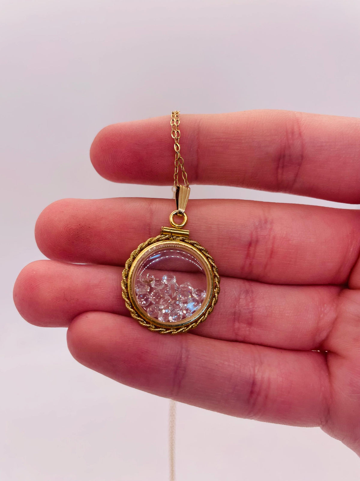 Hand made 21 mm nickel size 14k gold filled lucite genuine white topaz shaker locket with rope edge.
