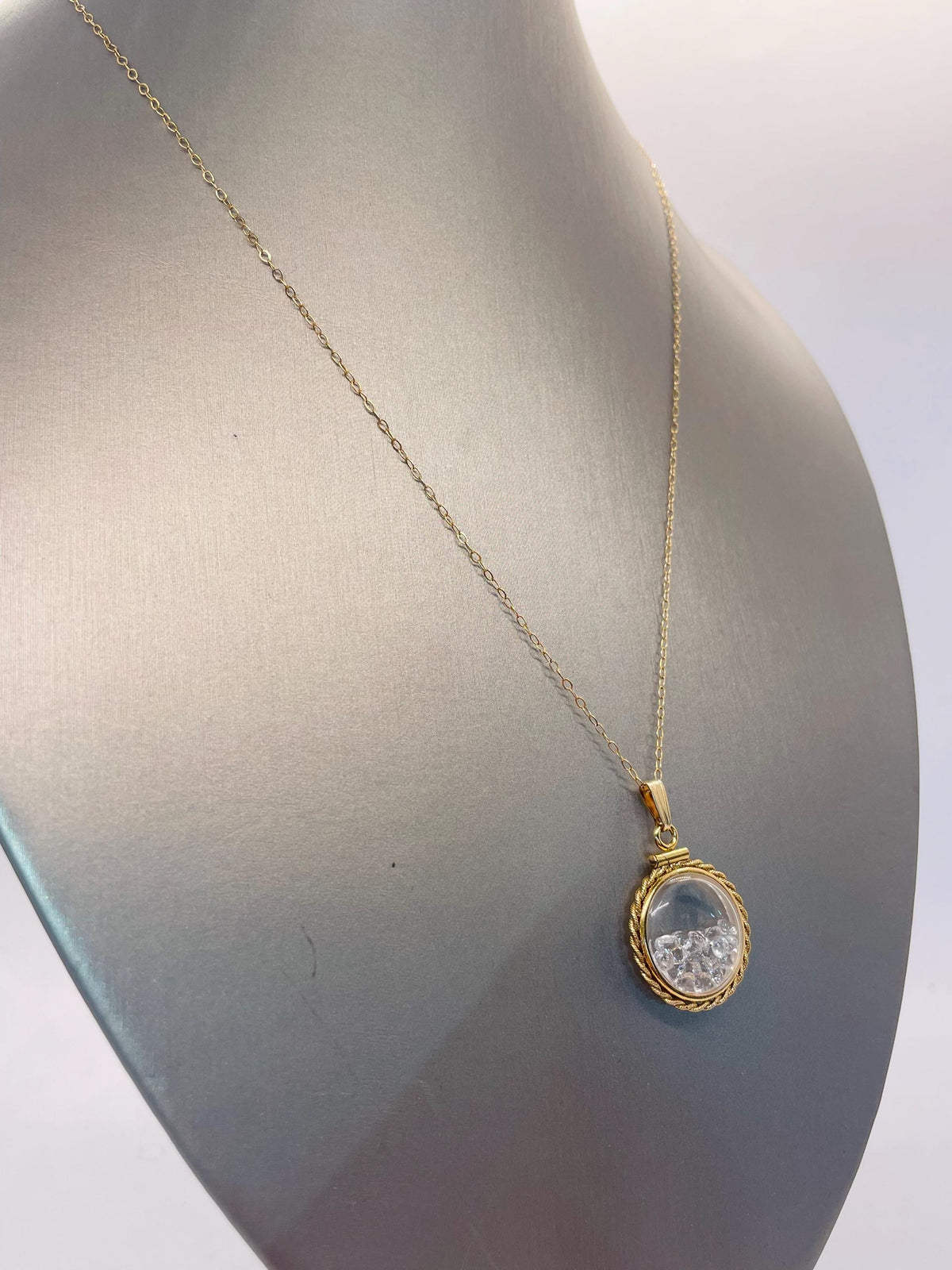 Hand made 21 mm nickel size 14k gold filled lucite genuine white topaz shaker locket with rope edge.