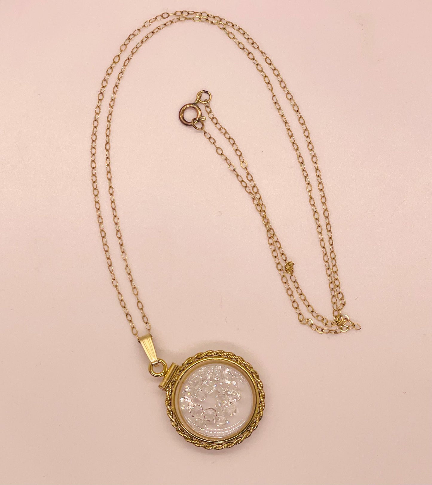 Hand made 21 mm nickel size 14k gold filled lucite genuine white topaz shaker locket with rope edge.