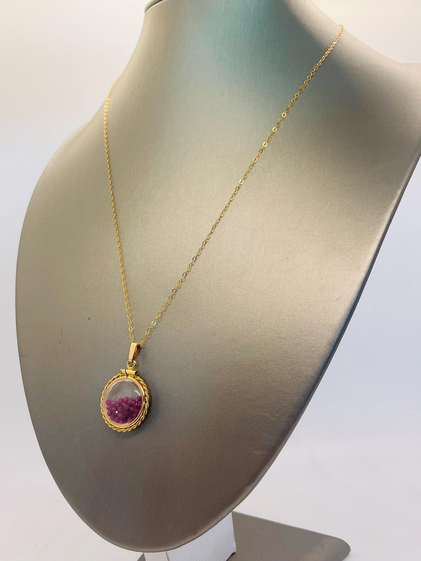 Hand made 21 mm nickel size 14k gold filled lucite genuine ruby shaker locket with rope edge and beautiful bead crystals.