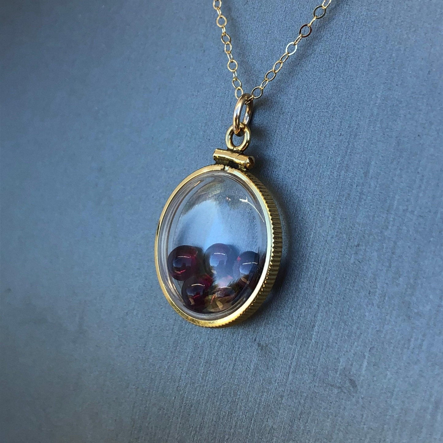 Vintage garnet shaker locket, 12k gold filled  w/ 4 ctw  of beautiful gems, january birthstone new old stock 50 years old  limited supply
