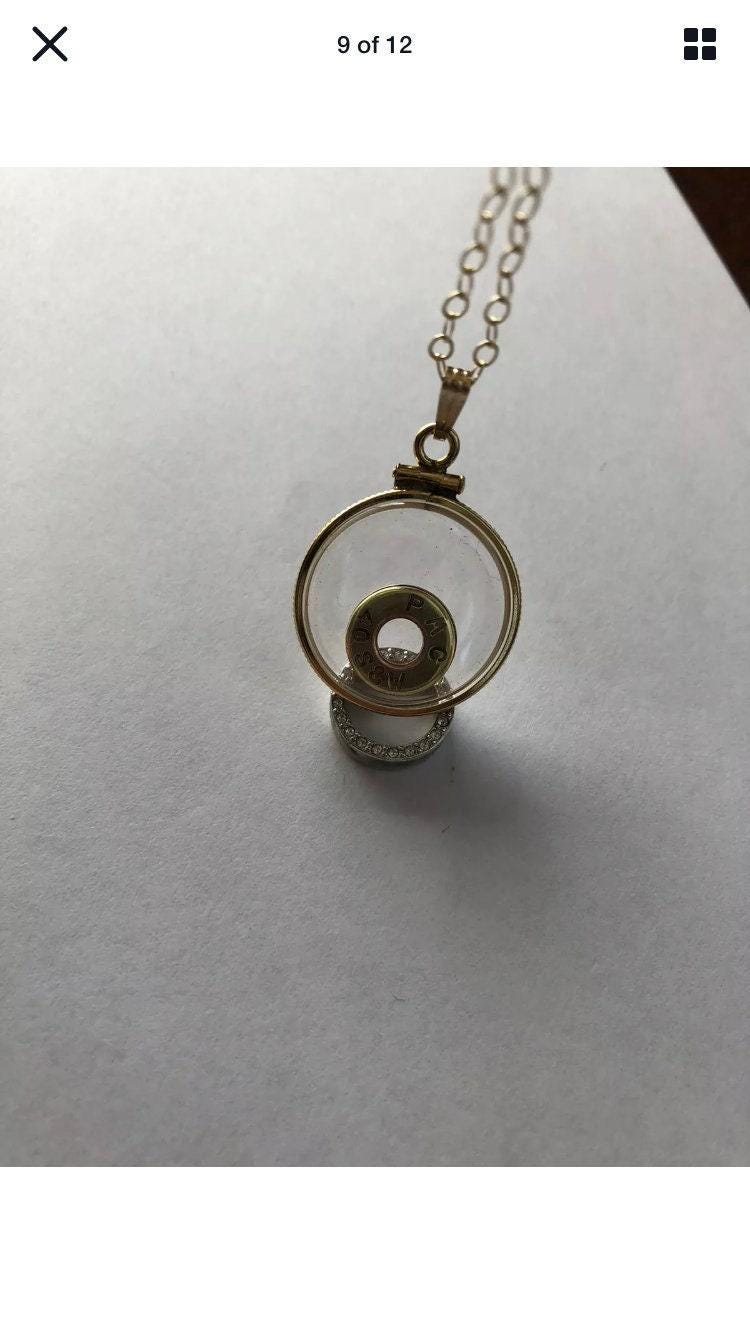 40 cal bullet necklace with floating amethyst vintage 12k gold filled locket