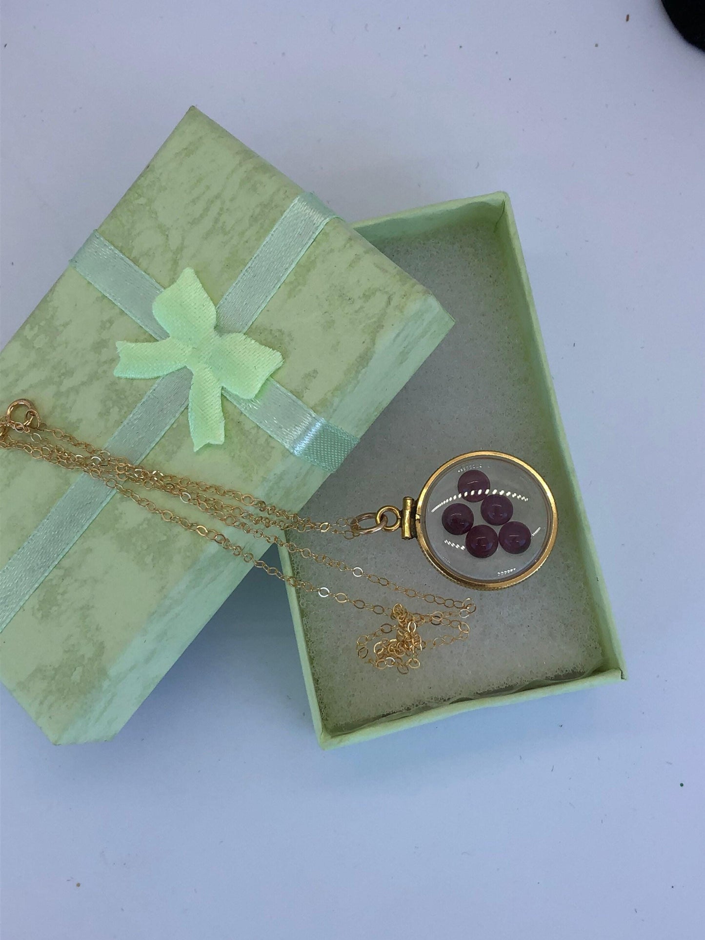 Vintage garnet shaker locket, 12k gold filled  w/ 4 ctw  of beautiful gems, january birthstone new old stock 50 years old  limited supply