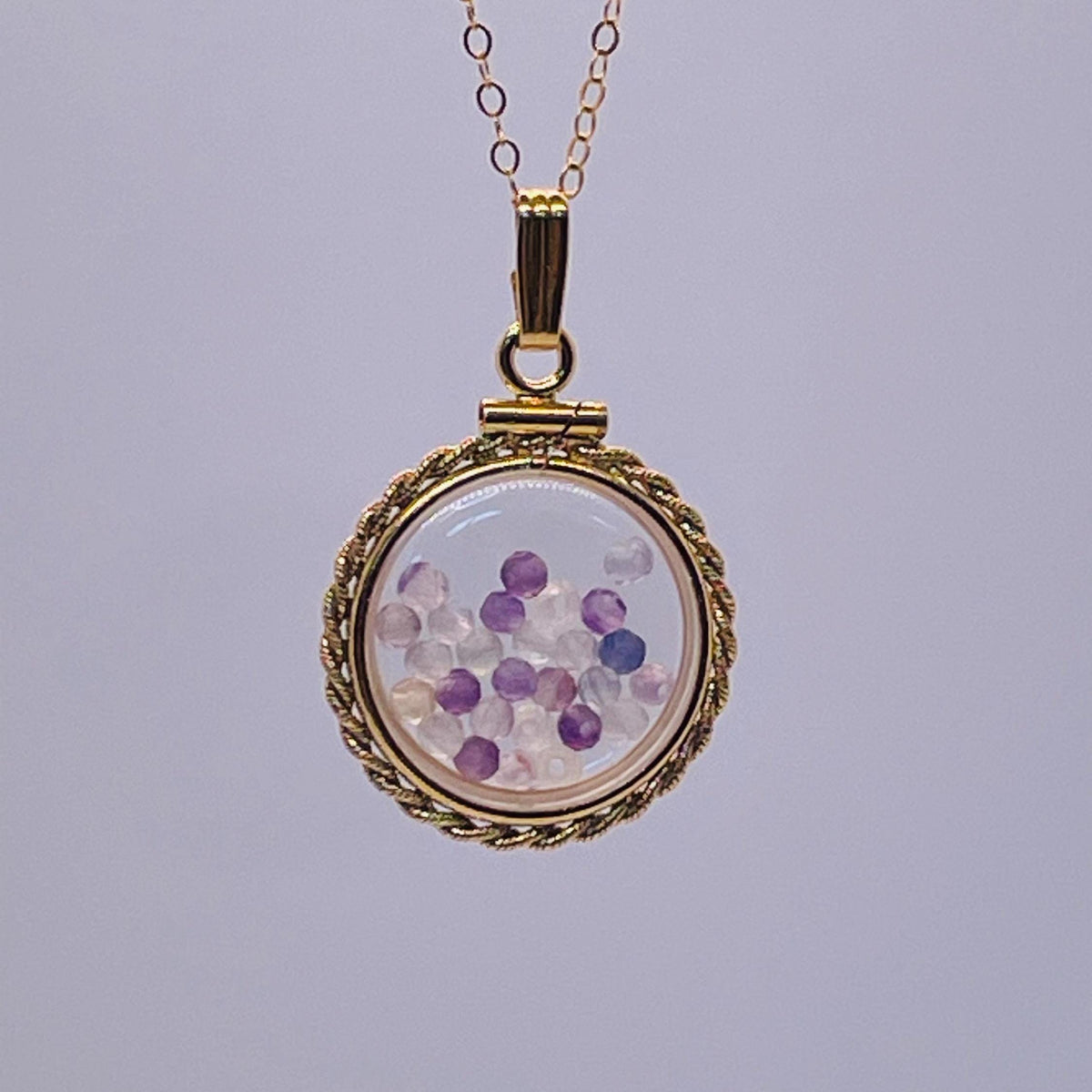 Hand made 21 mm nickel size 14k gold filled lucite genuine fluorite shaker locket with rope edge, with beautiful bead crystals.