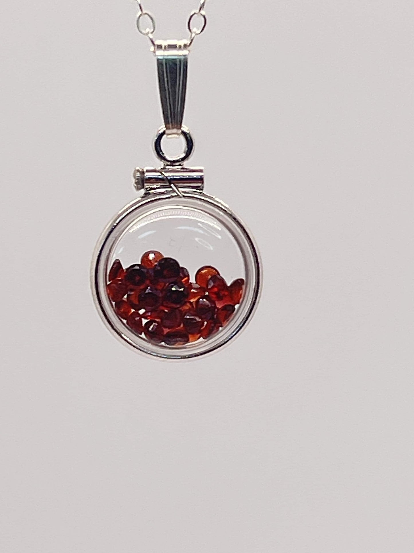 Handmade diminutive sterling silver garnet shaker locket lucite view locket, necklace, beautiful january birthstone. 1.65 tcw, red round cut