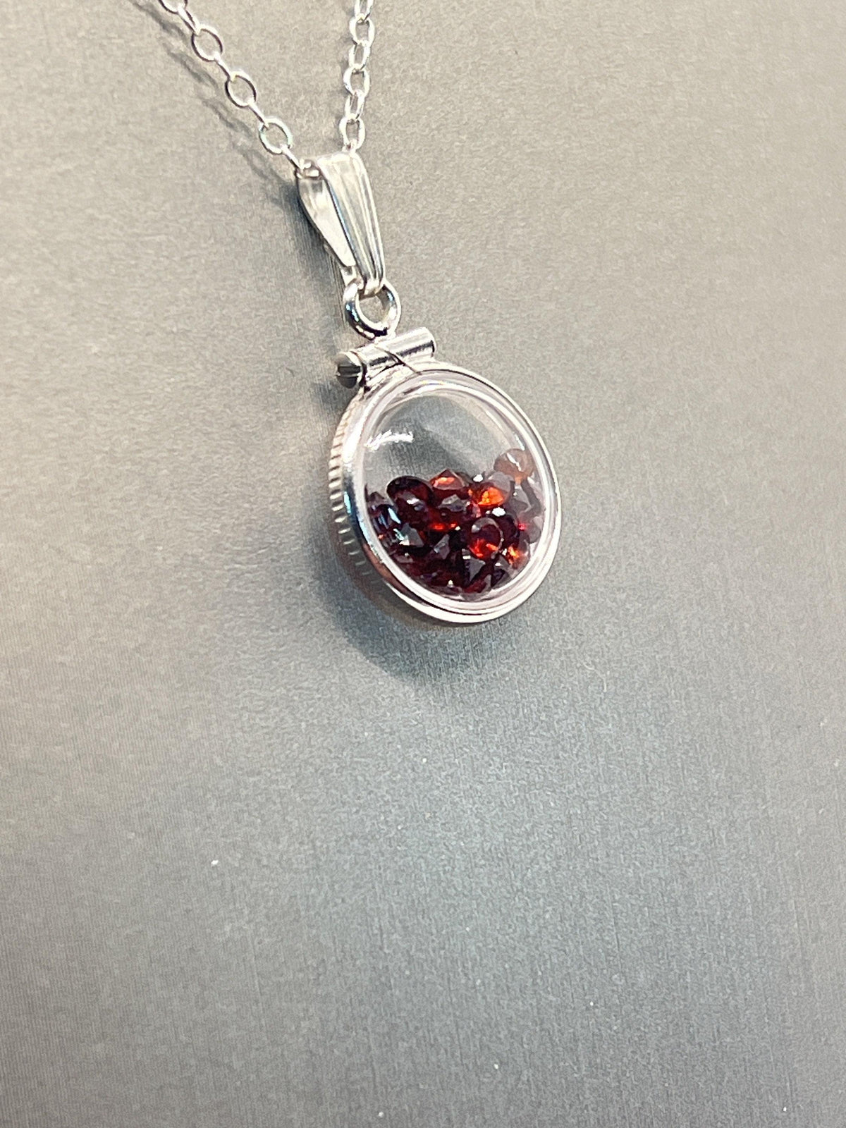 Handmade diminutive sterling silver garnet shaker locket lucite view locket, necklace, beautiful january birthstone. 1.65 tcw, red round cut